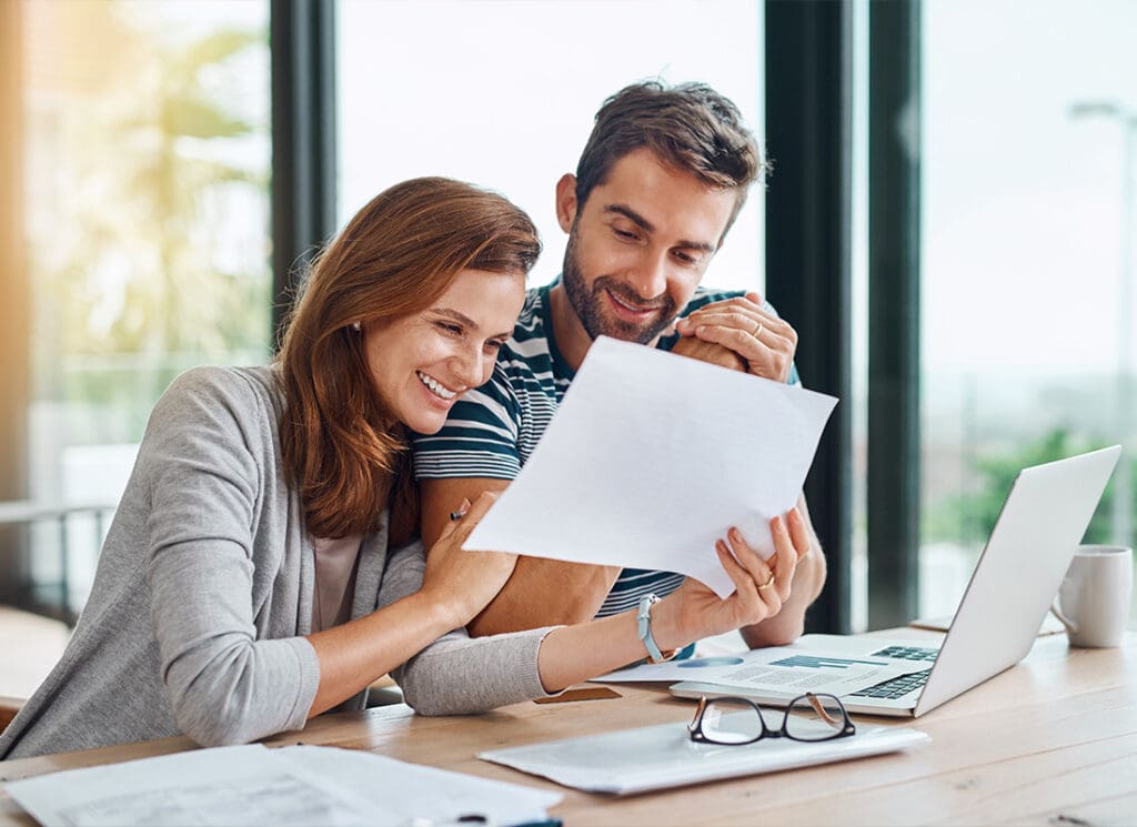 Client Portal - Young Couple Handling Personal Finances at Home