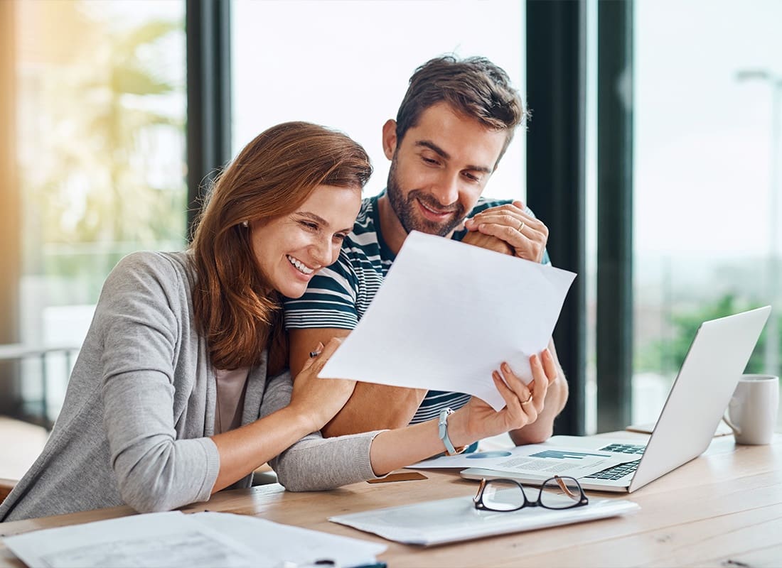 Client Portal - Young Couple Handling Personal Finances at Home